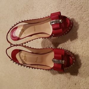 Christian Louboutin size 40 1/2 color Red leather and silver hardware 100% AUTHE